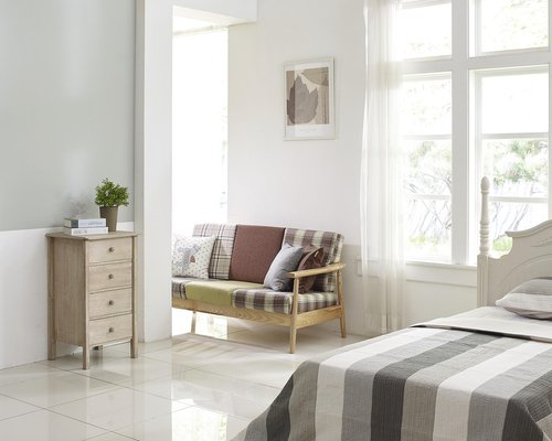 Modern room with soft acoustic panels and a fan